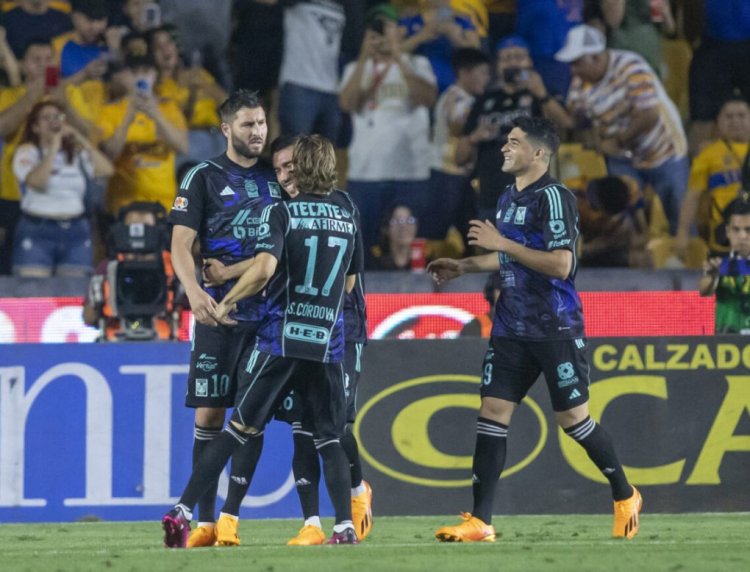 Tigres' Andree Pierre Gignac (L) celebrates after scoring against Puebla during their Mexican Clausura football tournament match at the Universitario stadium in Monterrey, Mexico on April 20, 2023. (Photo by JCA / AFP) (Photo by JCA/AFP via Getty Images)